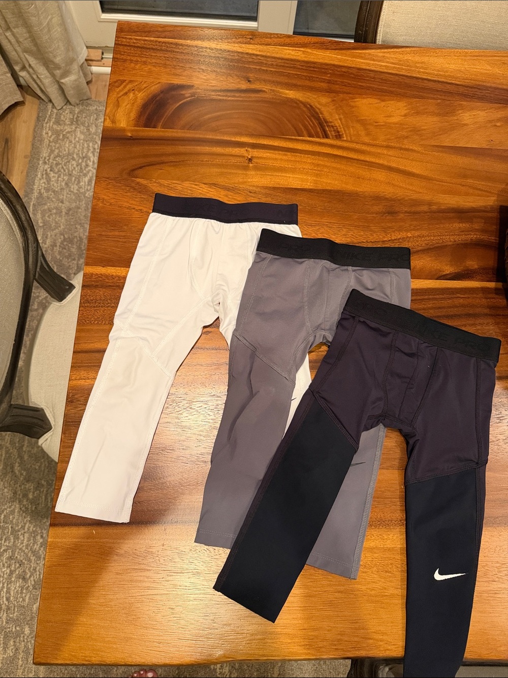 Nike Three-Pack Performance Leggings in White, Gray, and Black 4T